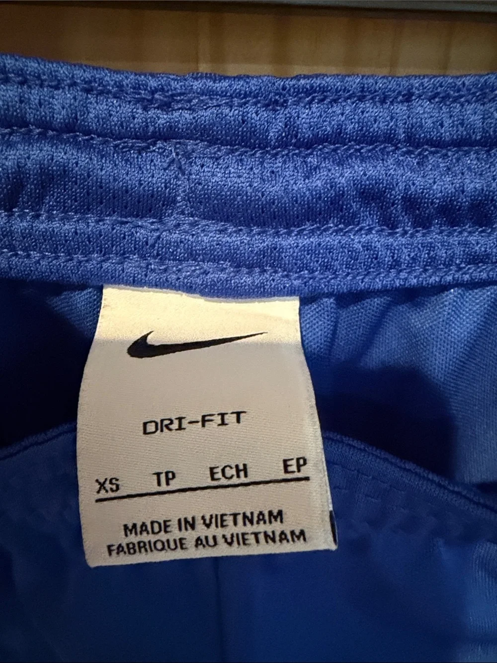 Nike Blue Kids Athletic Shorts with White Swoosh